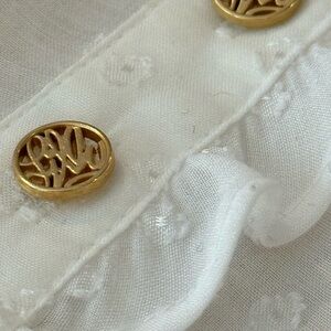 Lilly Pulitzer white polka dot blouse w/ gold buttons & ruffles along collar Med